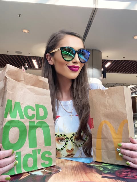 May be an image of burger, french fries and text that says 'MCD on Id's'