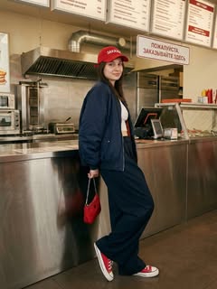 May be an image of sweatpants and text