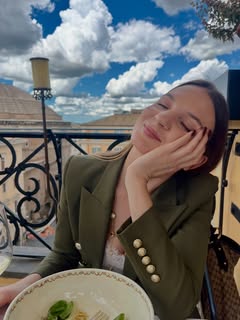 May be an image of blazer, Piazza di Spagna and text