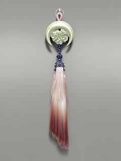 May be an image of hairpin, brooch and text