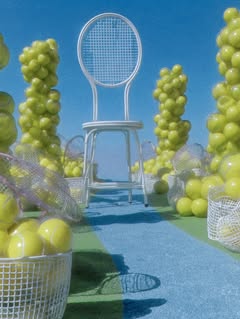 May be an image of racket and ball