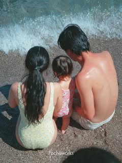 May be an image of child, beach and text