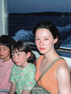 May be an image of bangs, child and text