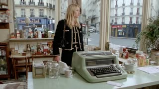 May be an image of typewriter, telephone and text