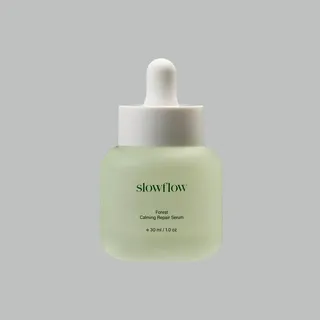 May be an image of one or more people, makeup, bottle, lotion and text that says 'slowflow Forest Calming CalmingRapairSerum RapairSerm Repair Serum e30ml/1.0oz 30ml /'